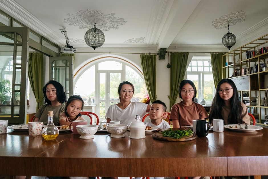 Family enjoying a meal at a custom dining table